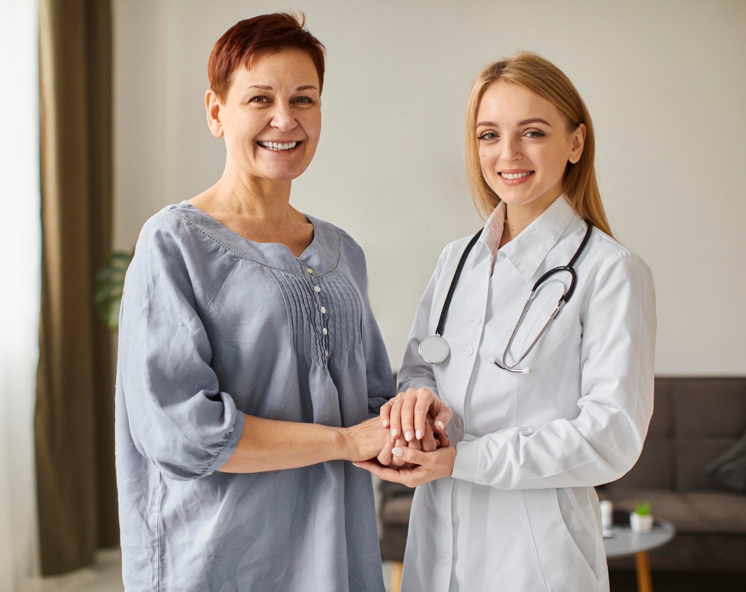 Breast Cancer survivor with doctor