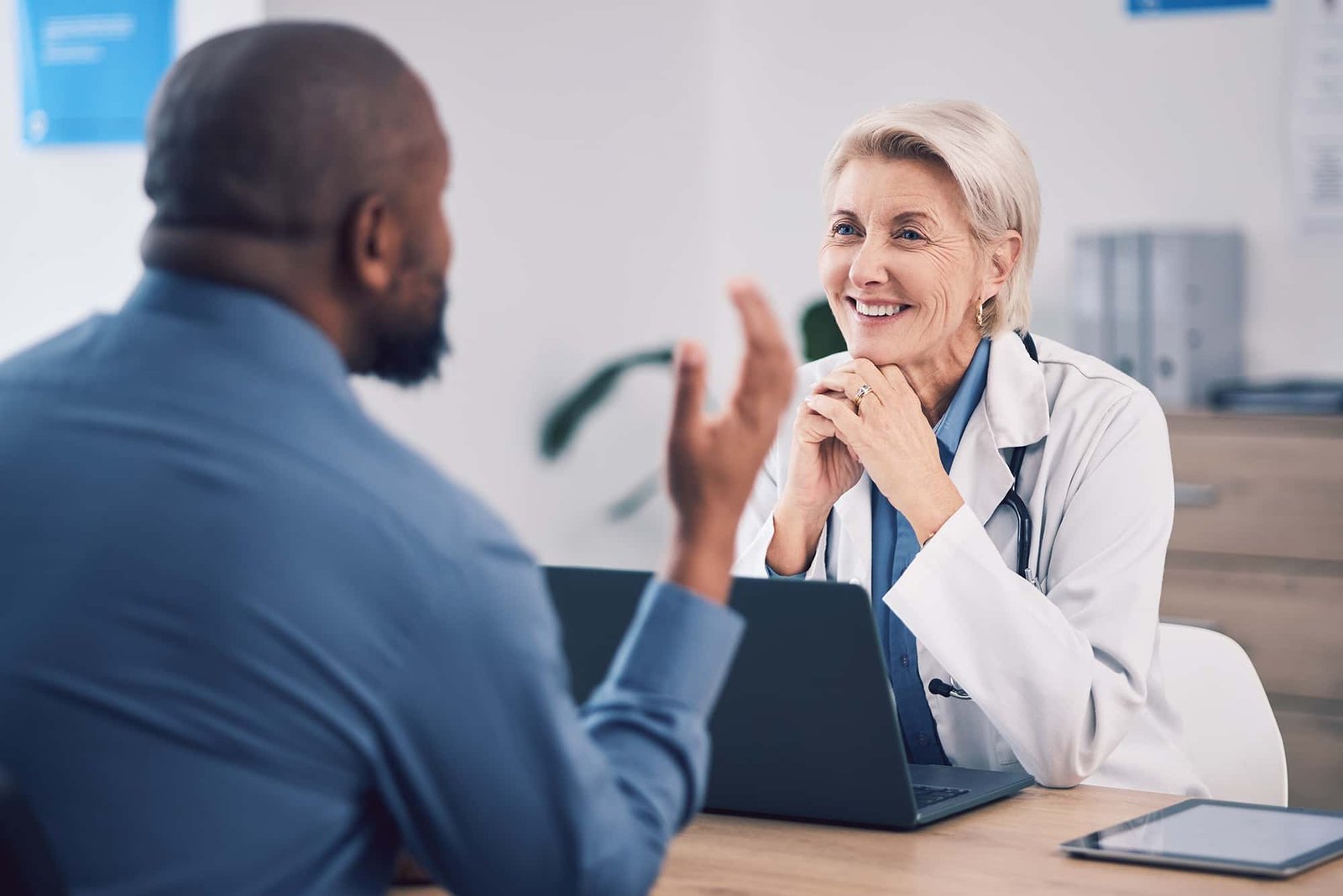 Oncologist consulting a male cancer patient at CurePoint Cancer Center